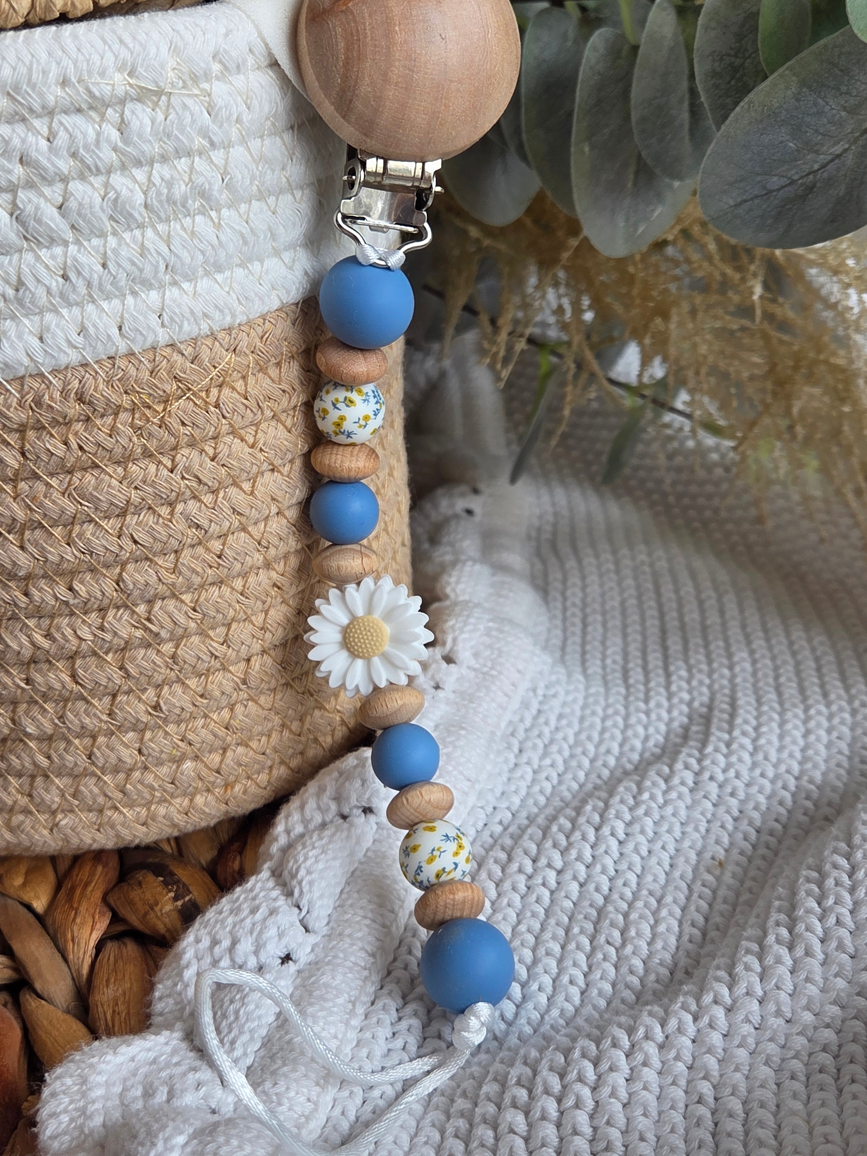 Attache-suce marguerite/bleu