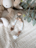 Attache-suce petit miracle ours blanc