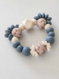 Anneau de dentition tête d'ours bleu fleuris doux