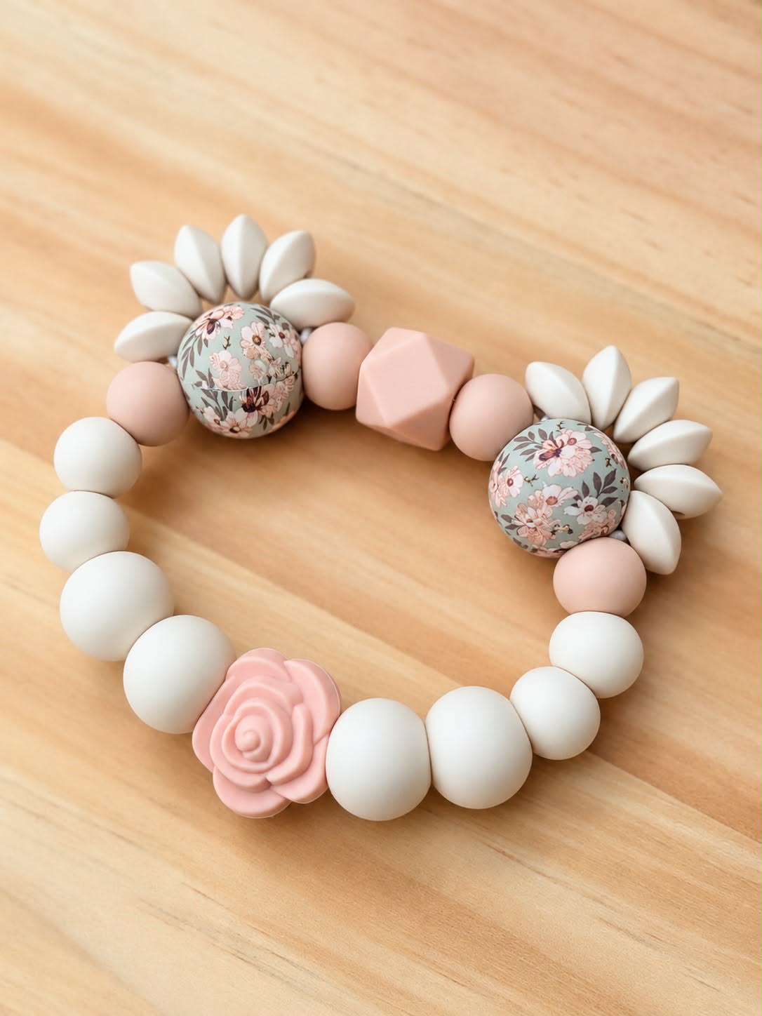 Anneau de dentition tête d'ours rose/fleuris