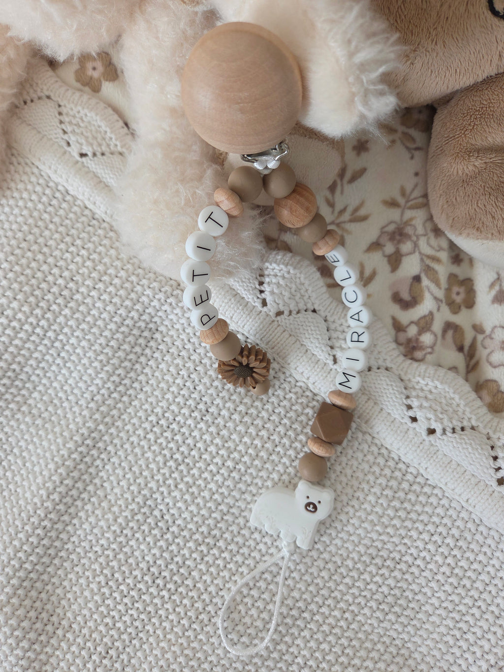 Attache-suce petit miracle ours blanc