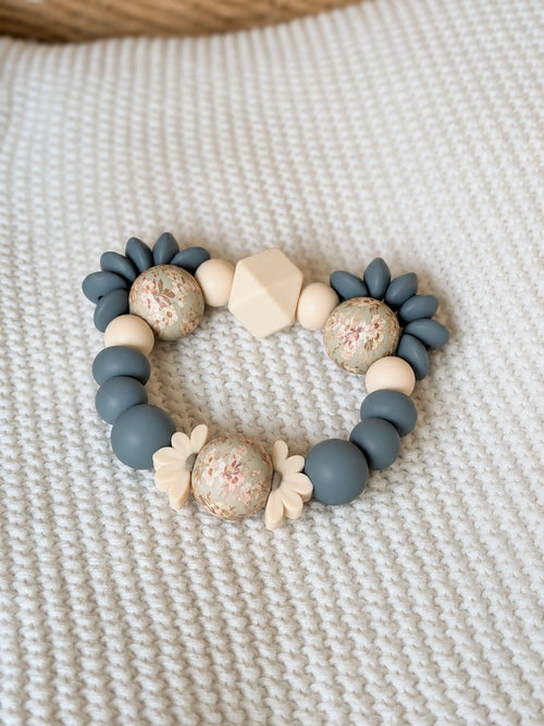 Anneau de dentition tête d'ours bleu fleuris doux